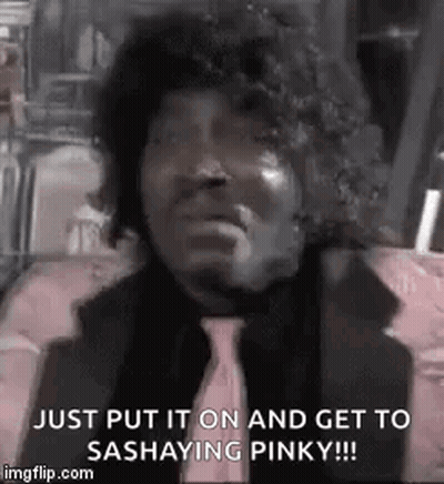 Man In Suit And Tie Making Funny Face GIF