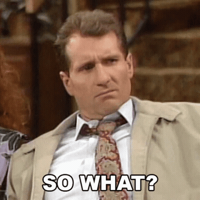 Man In Suit And Tie Making Funny Face GIF