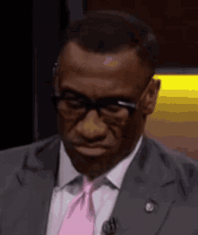 Man In Suit And Tie Making Funny Face GIF