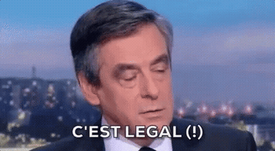 Man In Suit And Tie Making Funny Face Saying C'est Legal GIF