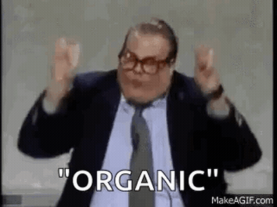 Man In Suit And Tie Making Funny Face Saying Organic GIF