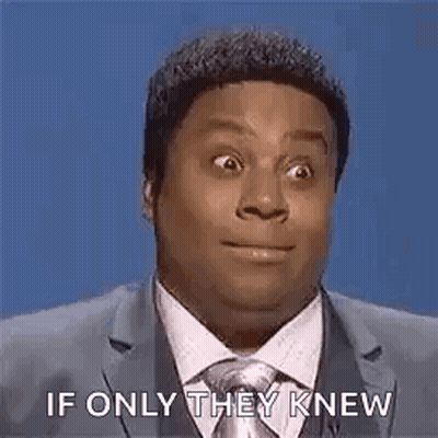 Man In Suit And Tie Making Funny Face GIF