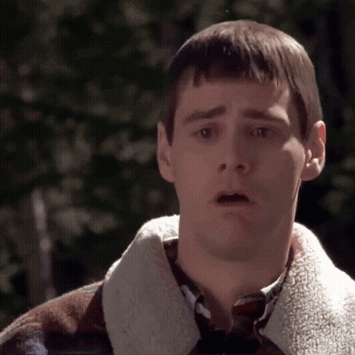 Man In Suit And Tie Making Funny Face GIF