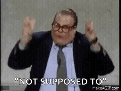 Man In Suit And Tie Making Funny Face GIF