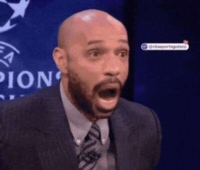 Man In Suit And Tie Mouth Open Saying Pion GIF