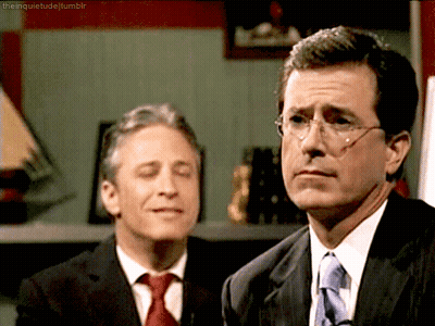 Man In Suit And Tie Next To Another Man GIF
