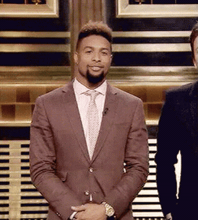 Man In Suit And Tie Next To Another Man GIF