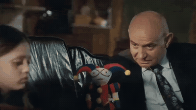 Man In Suit And Tie Next To Girl Holding Stuffed Animal GIF