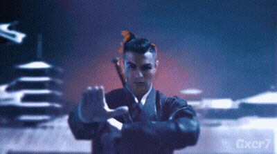 Man In Suit And Tie Next To Gxcr7 Sign GIF