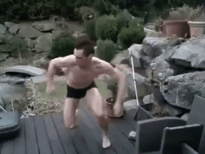 Man In Suit And Tie Next To People GIF