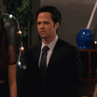 Man In Suit And Tie Next To Woman GIF