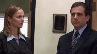 Man In Suit And Tie Next To Woman GIF