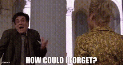 Man In Suit And Tie Next To Woman In Dress GIF