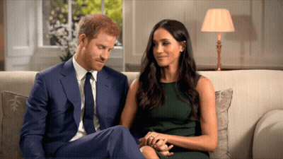 Man In Suit And Tie Next To Woman In Green Dress GIF