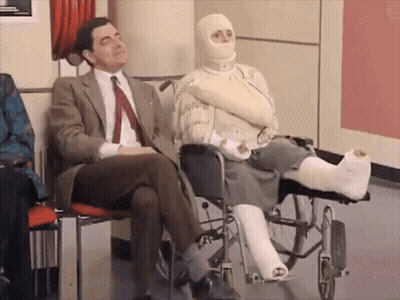 Man In Suit And Tie Next To Woman In Wheelchair GIF