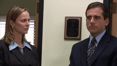 Man In Suit And Tie Next To Woman GIF