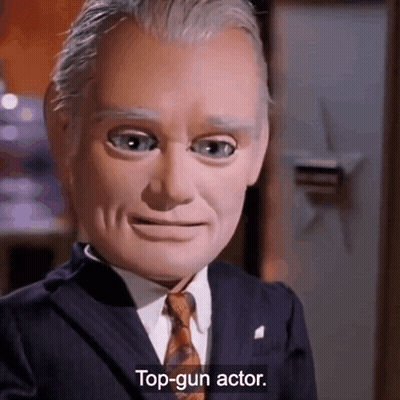 Man In Suit And Tie On Being Top Gun Actor GIF