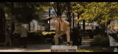 Man in Suit and Tie on Bench