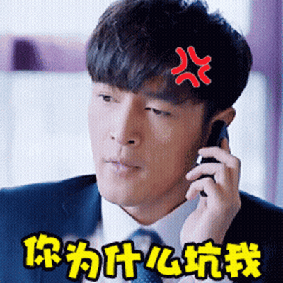 Man in Suit and Tie on Phone With Chinese Writing