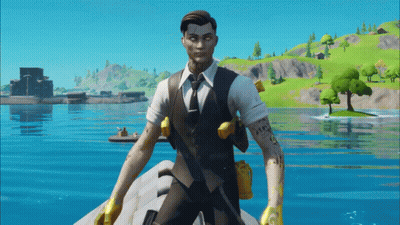 Man In Suit And Tie On Rock By Water GIF