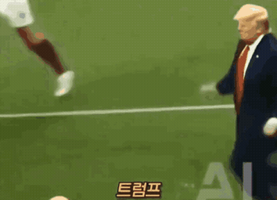 Man In Suit And Tie On Soccer Field GIF