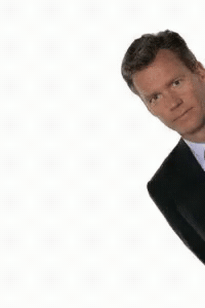Man in Suit and Tie Peeking