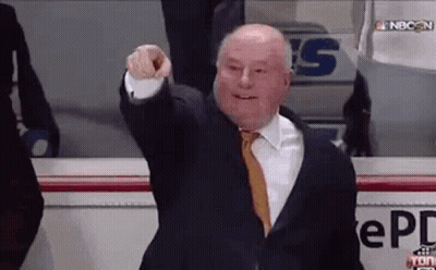 Man In Suit And Tie Pointing At Camera GIF