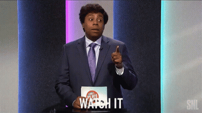 Man In Suit And Tie Pointing Saying Watch It GIF