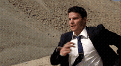 Man In Suit And Tie Running GIF