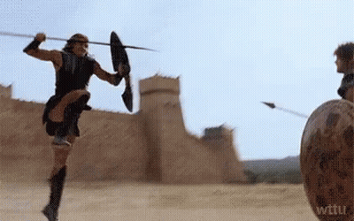 Man In Suit And Tie Saying Achilles Irl GIF