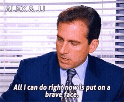 Man in Suit and Tie Saying All I Can Do Right Now Is Put On a Brave Face