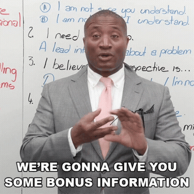 Man In Suit And Tie Saying Bonus Information GIF