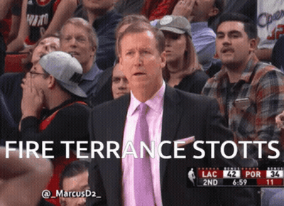 Man in Suit and Tie Saying Fire Terrance Stotts