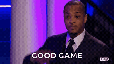 Man In Suit And Tie Saying Good Game Holding Football GIF