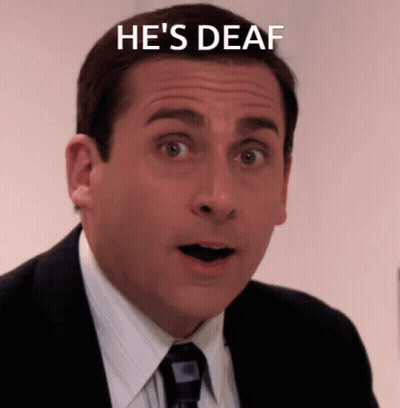 Man In Suit And Tie Saying He's Deaf GIF