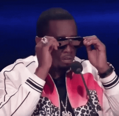 Man In Suit And Tie Saying Help GIF