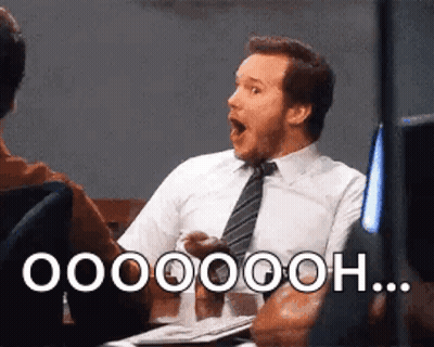 Man In Suit And Tie Saying Hooooh GIF