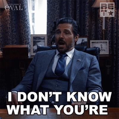 Man In Suit And Tie Saying I Don't Know GIF