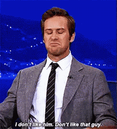Man In Suit And Tie Saying I Don't Like Him GIF