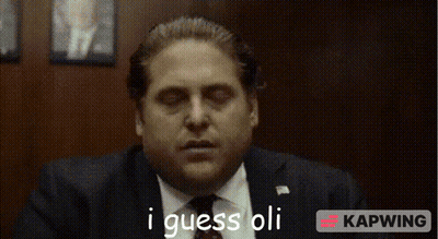 Man In Suit And Tie Saying I Guess Oli GIF