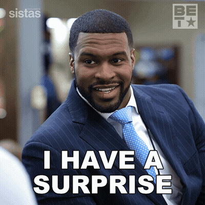 Man In Suit And Tie Saying I Have A Surprise GIF