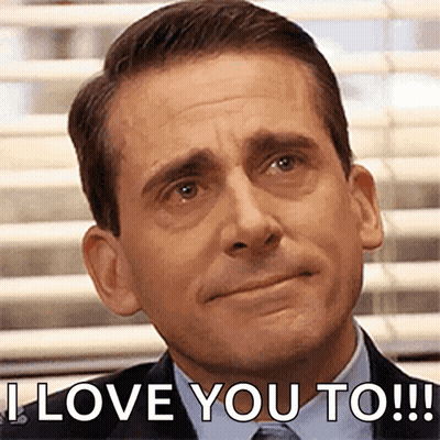 Man In Suit And Tie Saying I Love You To GIF