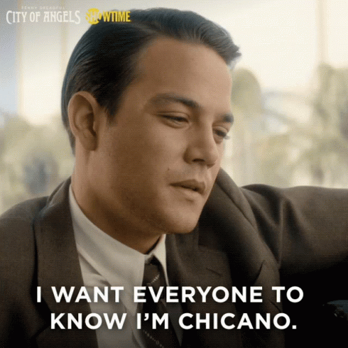 Man In Suit And Tie Saying I M Chicano GIF