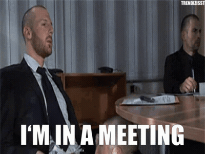 Man In Suit And Tie Saying I'm In A Meeting GIF