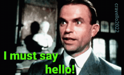 Man In Suit And Tie Saying I Must Say Hello GIF