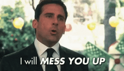 Man In Suit And Tie Saying I Will Mess You Up GIF