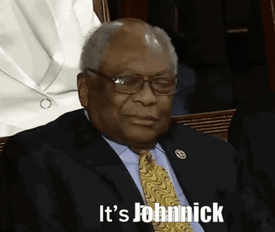 Man In Suit And Tie Saying It's Johnnick GIF