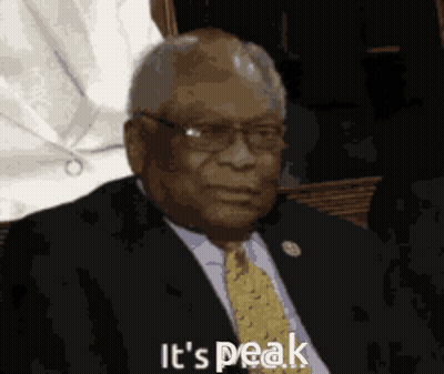 Man In Suit And Tie Saying It's Peak GIF
