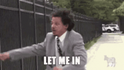 Man In Suit And Tie Saying Let Me In GIF