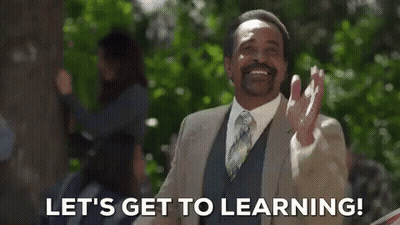 Man In Suit And Tie Saying Let's Get To Learning GIF